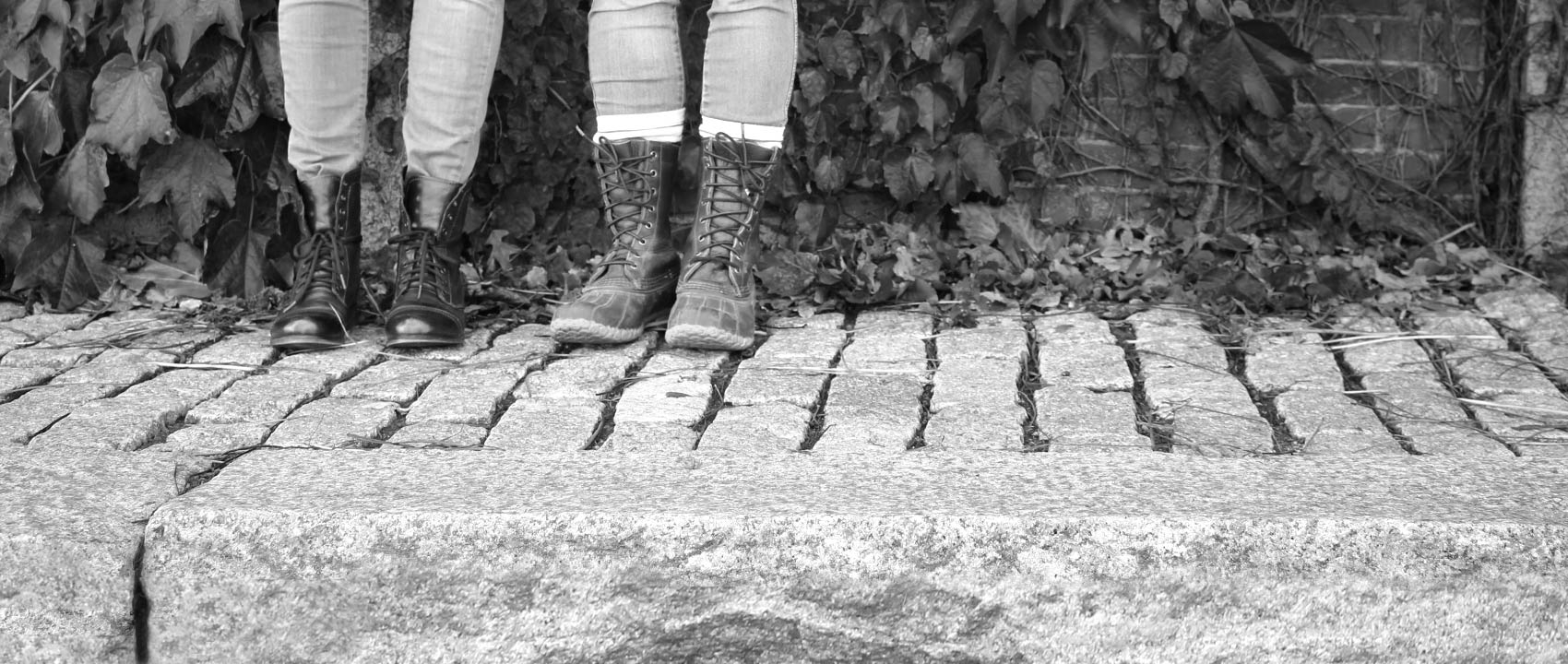 Meg and Elise standing on a brick sidewalk
